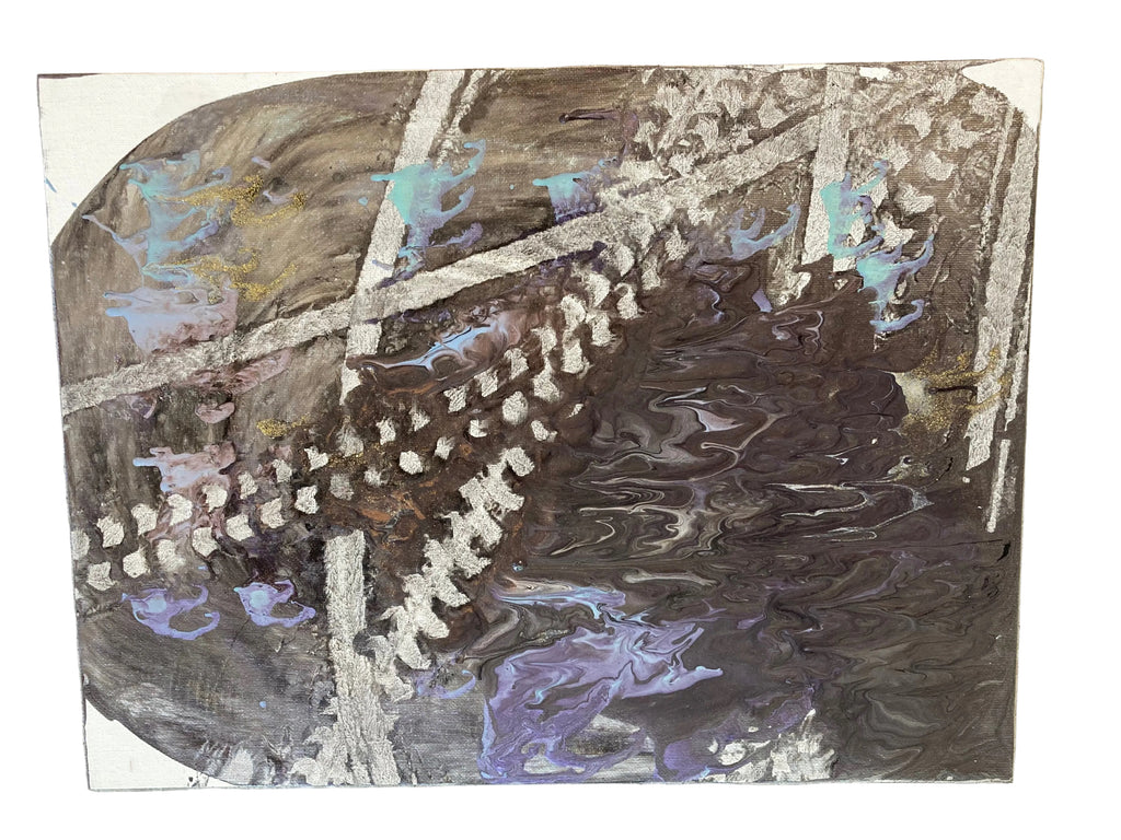 Abstract art piece on a textured surface